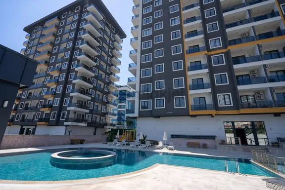 Alanya Mahmutlarda Havuz Manzaralı Lüks Kompleks 2+1 Satılık Daire 1