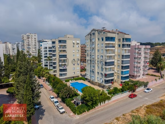 Güzeloba Örnekköyde Doğalgazlı Havuzlu Deniz Manzaralı 2+1 1