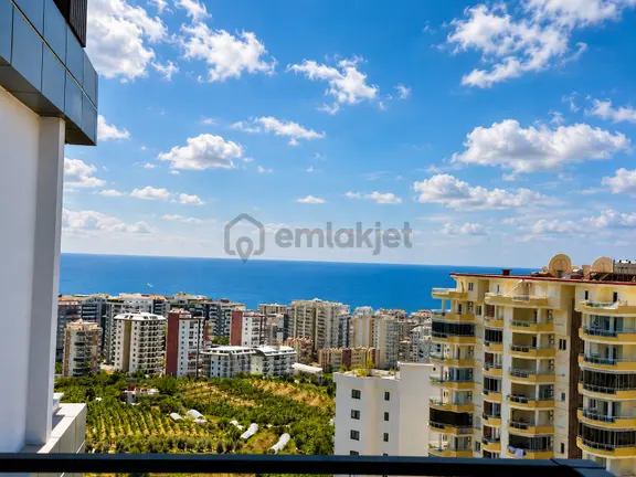 Alanya Mahmutlar’da Deniz Manzaralı Full Yerden Isıtmalı 1+1 Lüks Daire 1