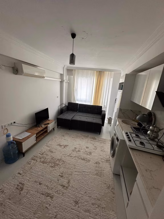 **depozitosuz**merkez Konumda Düzgün Bina Yeni Eşyalı 1+1** 1