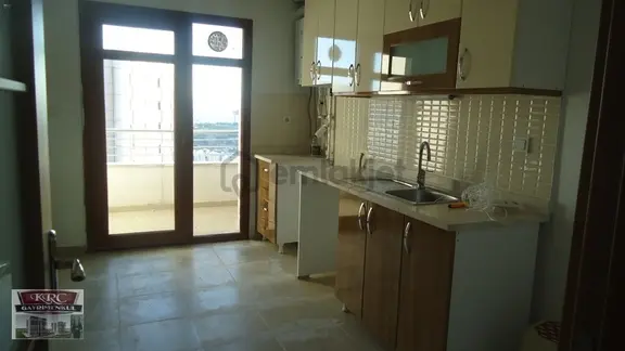 Krc'den Merkezi Konumda Katta Manzaralı Kiralık 3+1 Daire 1