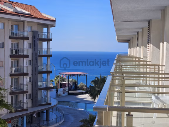 Kuşadası Ramada Suites'te Satılık Deniz Manzaralı 1+0 Daire 1