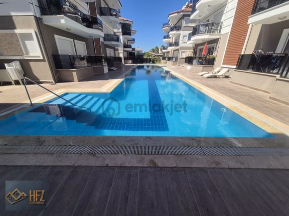 Dalaman Hürriyette Havuzlu Sitede Eşyalı 2+1 Ara Kat, 3 Cepheli 2
