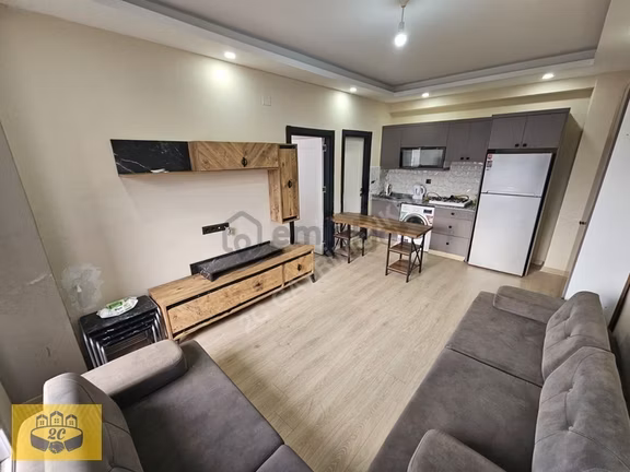 Migrosa Yakın Ulaşımı Kolay Balkonlu Eşyalı 1+1 Kiralık Daire 1