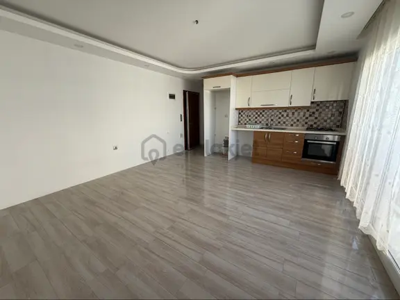 Kuşadası İkiçeşmelik Mahallesinde Boş Kiralık 1+1 Daire 1