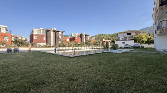 Pascha Emlak'tan Havuzlu Butik Sitede Satılık 1+1 Daireler 1
