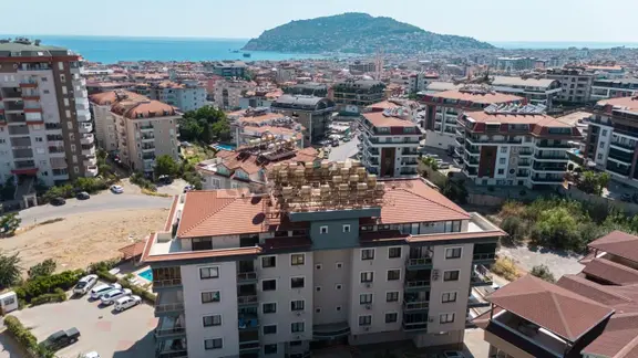 Alanya Cikcilli'de Satılık 5+1 Ayrı Mutfak Ful Eşyalı Kale Manzaralı Daire 1