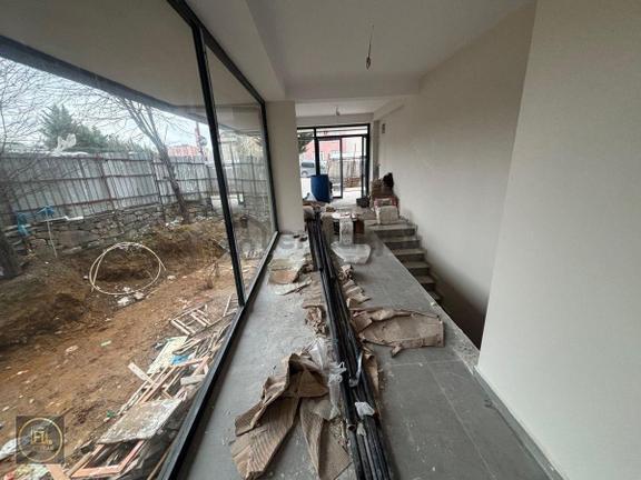 F-l Emlaktan Karlıdere Cadde Sınırı Sıfır Binada İki Katlı Bahçeli Dükkan 1