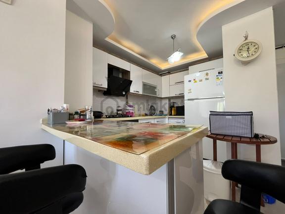 Yükselden Akçayda Ön Cephe Ara Kat Cam Balkonlu Doğalgazlı 1+1 2