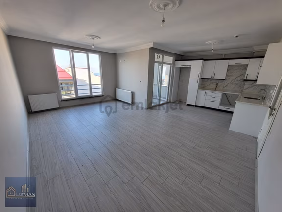 Uzman Emlak'tan 2+1 Deniz Manzaralı 5.katta Kiralık Daire 1