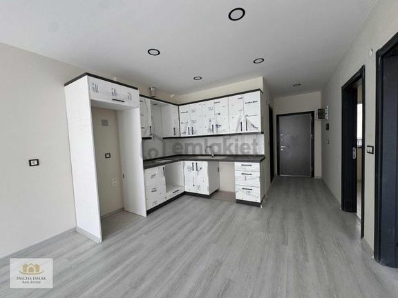 Pascha Emlak'tan Satılık Güzelçamlı Merkezde Sıfır 2+1 Daire 2