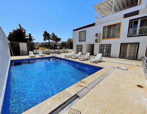 Bodrum Eskiçeşme'de Satılık Havuzlu Lüks 1+1 Daire 1