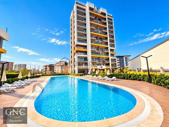Altıntaş'ta Konsept Sitede Deniz Ve Havuz Manzaralı 1+1 Satılık 1