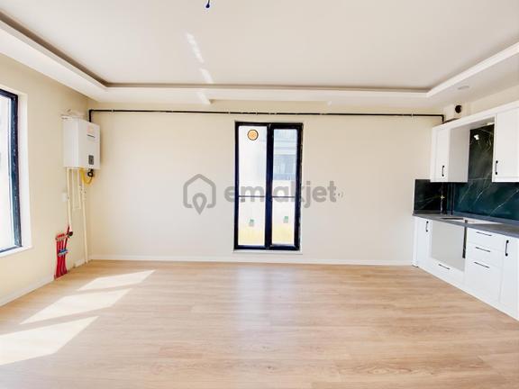 Alaçatı'dan Taşpınar'da Bahçe Kullanımlı Geniş 1+1 Kiralık Daire 1