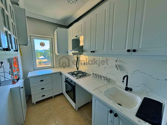 Uytundan Burhaniye Bahçelievlerde Doğalgazlı Site İçi 2+1 Daire 1