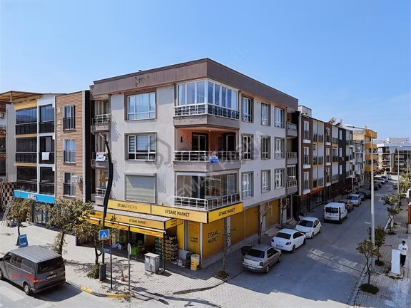Kuşadası Davutlar Kılınç Apt. 3+1 135m2 Ayrı Mutfak Cadde Üzeri. 1