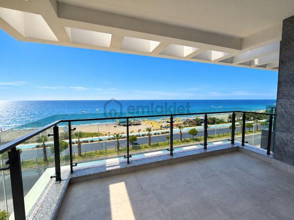 Alanya Mahmutlar’da Denize Sıfır Ön Cephe Panoramik Deniz Manzaralı 2+1 Daire 1