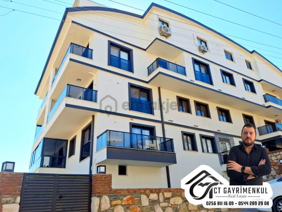 Didim'de Satılık 2+1 Ayrı Mutfak Deniz Manzaralı Teras Balkonlu Ön Cephe Daire ! 1