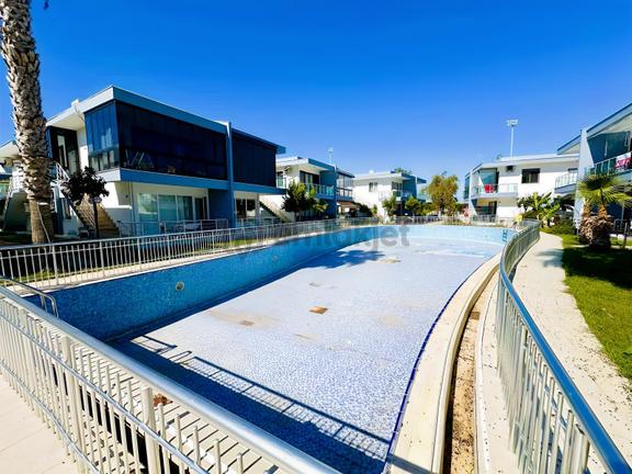 Oteller Bölgesinde Havuzlu Sitede Bahçe Kullanımlı Daire 2