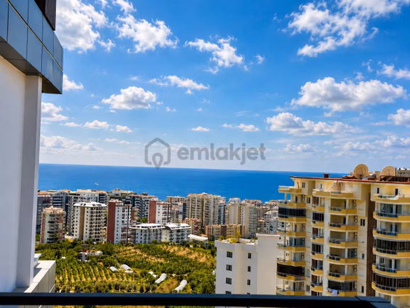 Alanya Mahmutlar’da Deniz Manzaralı Full Yerden Isıtmalı 1+1 Lüks Daire 1