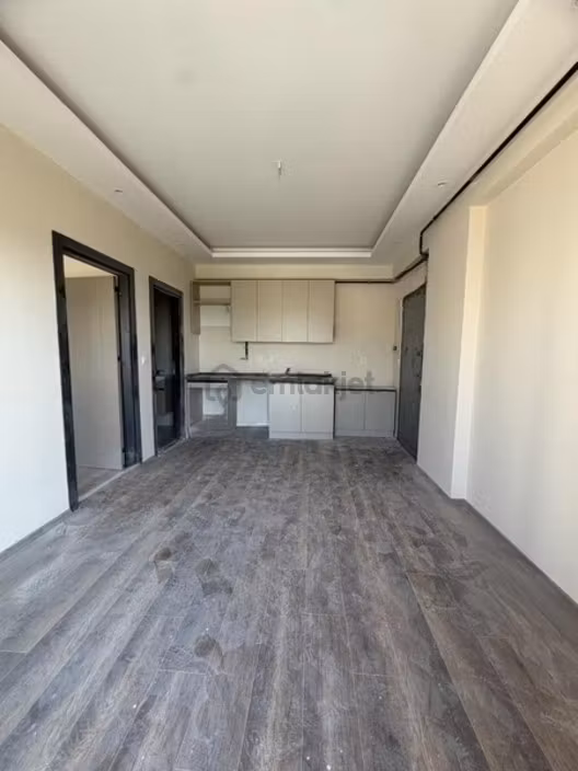 Tetik Emlak'tan Gültepe Migrosa Yürüme Mesafesin'de 1+1 Daire 1