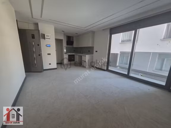 Denize Çok Yakın Kaliteli Sıfır Binada Ara Katta Geniş 1+1 1