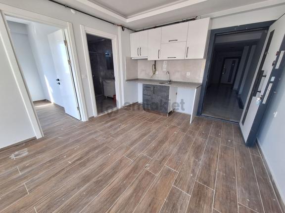 Buluruzdan Ana Cadde Üzerinde Kiralık Ara Kat 1+1 Daire 1