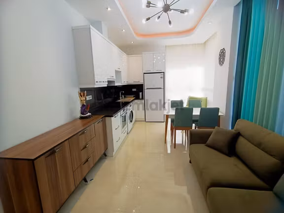 Alanya Mahmutlar'da Kapalı Havuzlu Sitede 2 Balkonlu Eşyalı 1+1 2