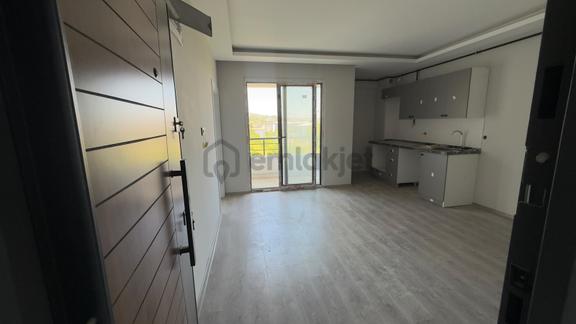 Remax Rahşan Çam | Taflanda Deniz Manzaralı Satılık 1+1 Daire 2