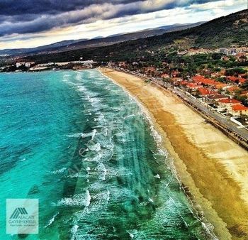 Alaçatı Gayrimenkul'den Ilıca'da Denize Yakın Arsa...