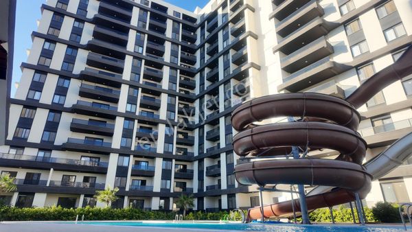 Kızkalesin'de 1+1 Merkezde Satılık Havuzlu Lüx Daire