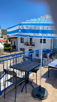 Marmaris Kale’de Otantik Detaylarıyla Öne Çıkan Kiralık Tribleks Villa