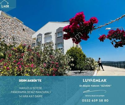 Didim Akbük'te Güvenlikli Havuzlu Sitede Panoramik Deniz Manzaralı 1+1 Ara Kat Daire