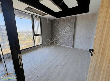 Necaroğulları Gayrimenkulden Araştırma Yanı Ay Yapı