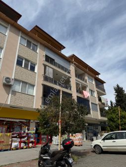 Kuşadası Güzelçamlı'da Ana Cadde Üstünde Ara Kat 3+1 Satılık Daire