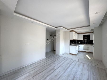 Kızıltoprak Mahallesinde Yatırımlık 1+1 Sıfır Daireler