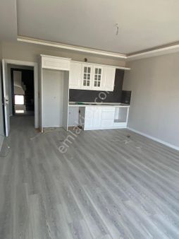 Kuşadası Davutlar'da Acil Satılık Havuzlu Daire