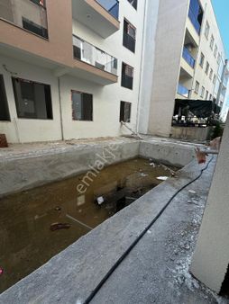 Kuşadası Davutlar Merkezde Satılık Havuzlu Sitede 1+1 Daireler