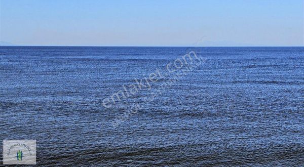 Karaburun'da Deniz Manzaralı Yola Cepheli Yeniliman Girişi Arsa