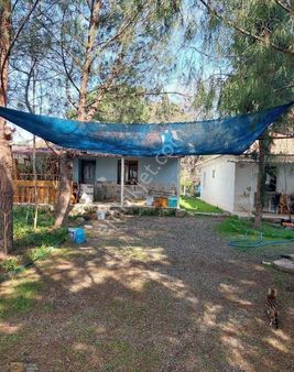 Dikili İsmetpaşa Da Çanakkale Ana Asfalti Üzerinde İcinde 2 Taş Evli 7.204 Metrelik Bahçe