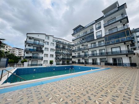 Aydın Didimde Havuzlu Ve Güvenlikli Site İçerisinde 2+1 Açık Mutfaklı Giriş Katlı Dairemiz Satılık