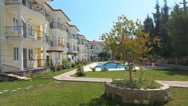 Dalaman'da Havuzlu Site'de Eşyalı 3+1 Dubleks Daire Satılık