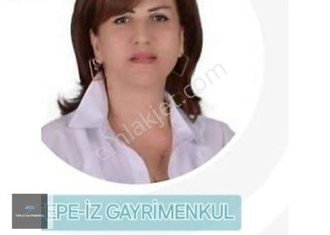 Urla İskele Ağaçlı Yolda 100m2 Evi Olan 4.950m2 Tarla