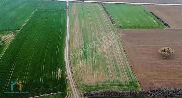 Torunlar Emlaktan Satılık 14.200m2 Anayol Cepheli Köşe Parsel