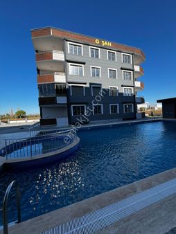 Ayvalık Altınova’nın Kalbinde Havuzlu Ve Sosyal Tesisli Modern 1+1 Yaşam Alanları!