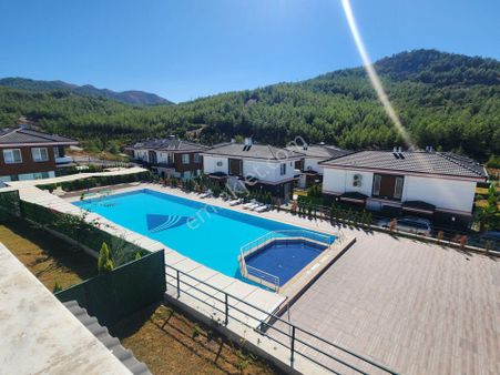 Dalaman Atakent'te Havuzlu Site'de Bahçeli 3+1 Villa Satılık