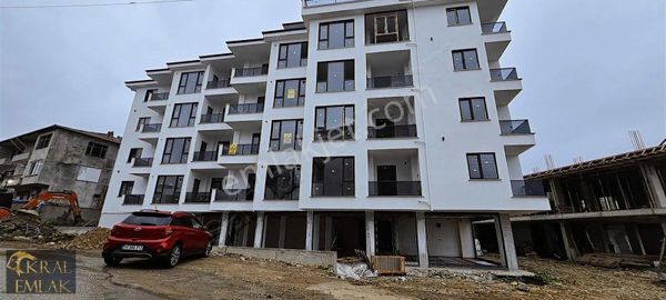 Çuhallı Çarşısında Deniz Manzaralı Sıfır Satılık 1+1 Daireler