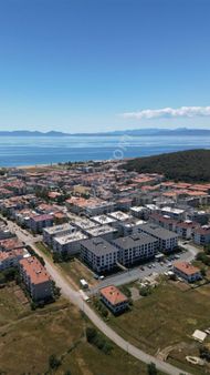 Ayvalık Sarımsaklı'da Havuzlu Ve Güvenlikli Site İçinde Satılık 2+1 Eşyalı Daire