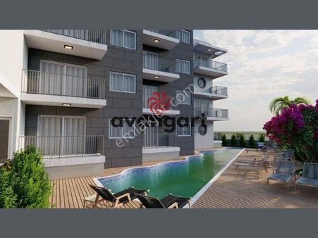 Kuşadası Davutlar'da Havuzlu Site İçerisinde Satılık Yeni 1+1 Daire