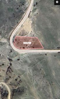 Yuvam Emlaktan Muşruf Köyü Radar Yolu Üzerinde 2.600 M2 Bağ Bahçe Yapılabilir Satılık Tarla